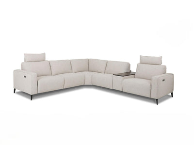 Modern L-shaped sectional sofa in light beige fabric with slim black legs, adjustable headrests, and a built-in side table